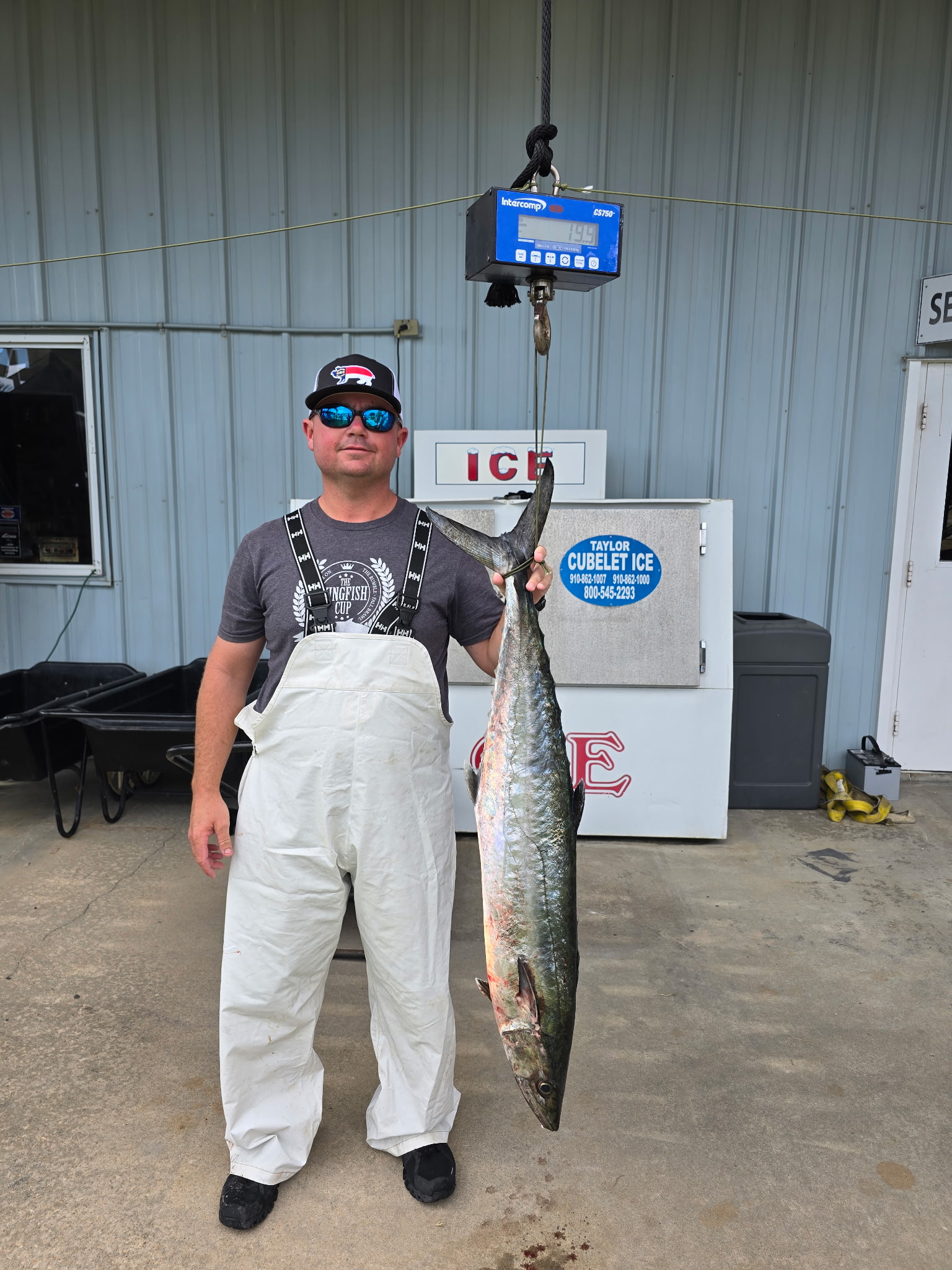 Tournament angler with king mackerel
